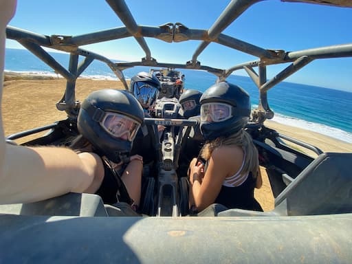 Family in a dune buggy